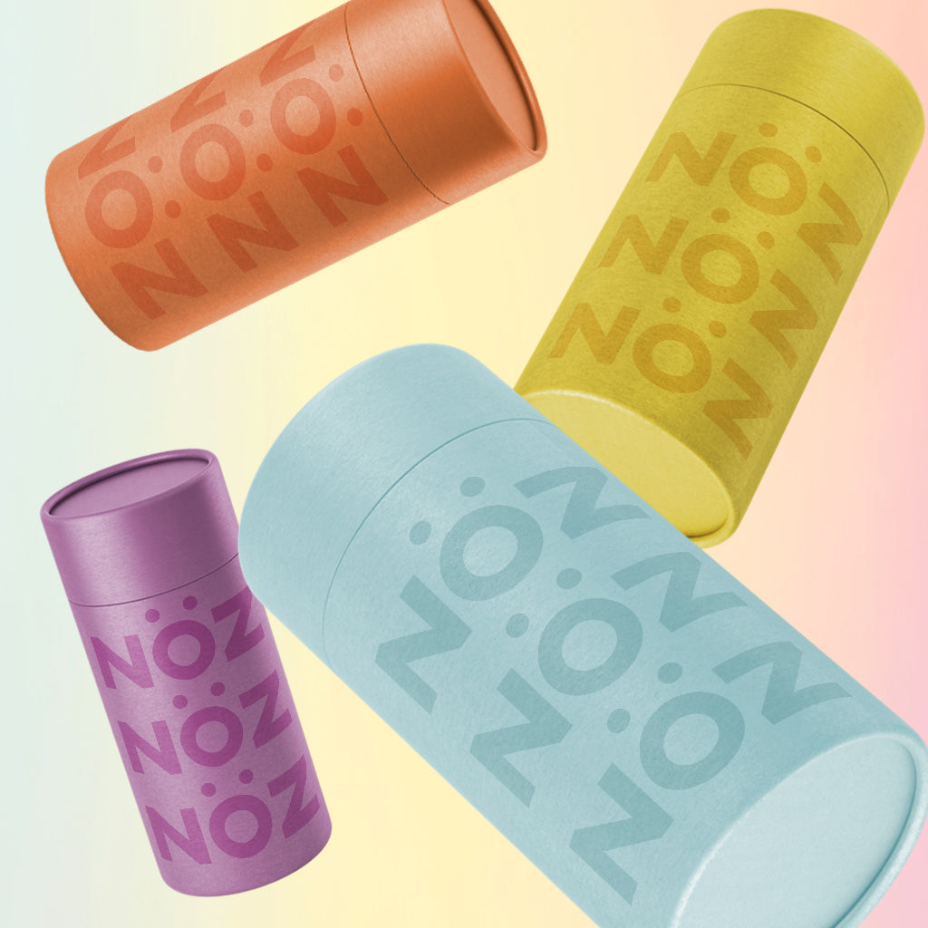 Orange, Yellow, Light blue, purples NöZ Sunscreen randomly place on foreground